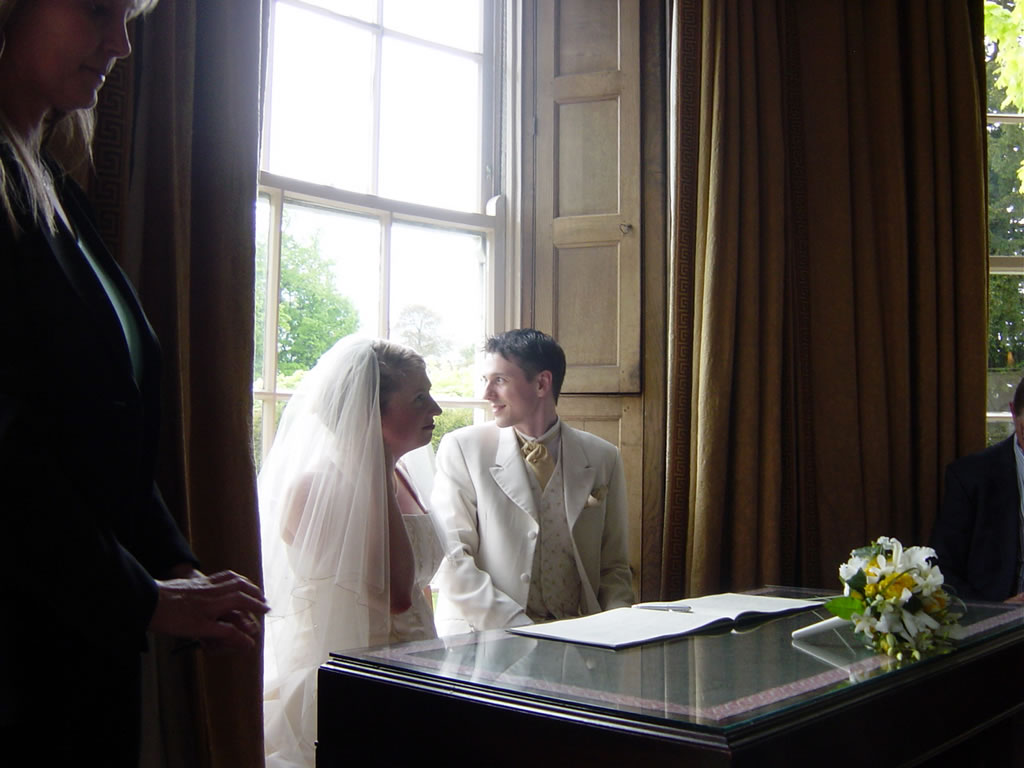 Charlotte & Tom contemplating just how many more photo's they will have to sit through