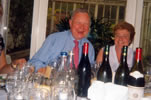 12. Robin Caven-Atack & Anne Caven-Atack surrounded by booze