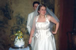 25. Tom & Charlotte cutting cake