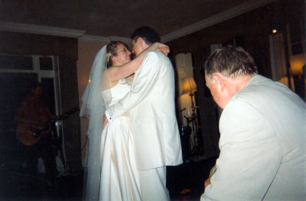 Charlotte & Tom dancing whilst being observed by Robin Caven-Atack
