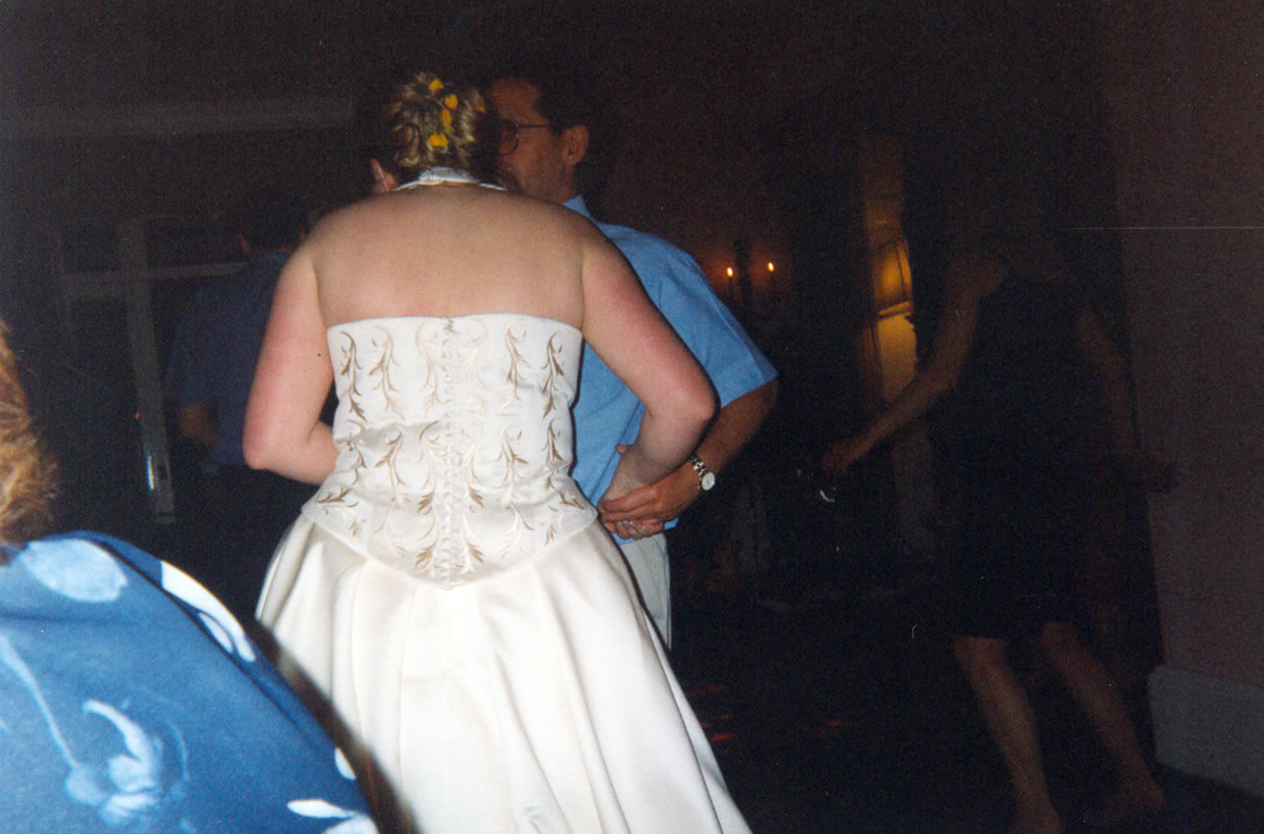 Charlotte dancing with a man who is not her husband