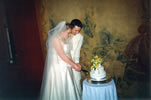 5. Charlotte & Tom cutting cake
