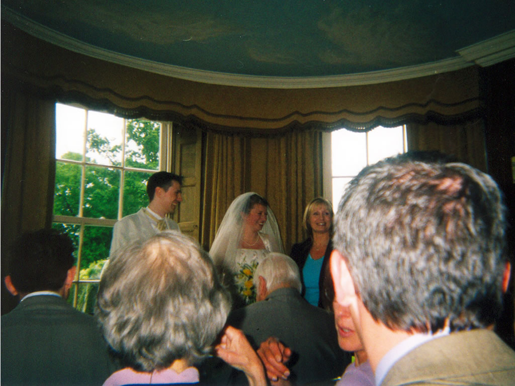 Tom & Charlotte & the registrar and the backs of some people's heads